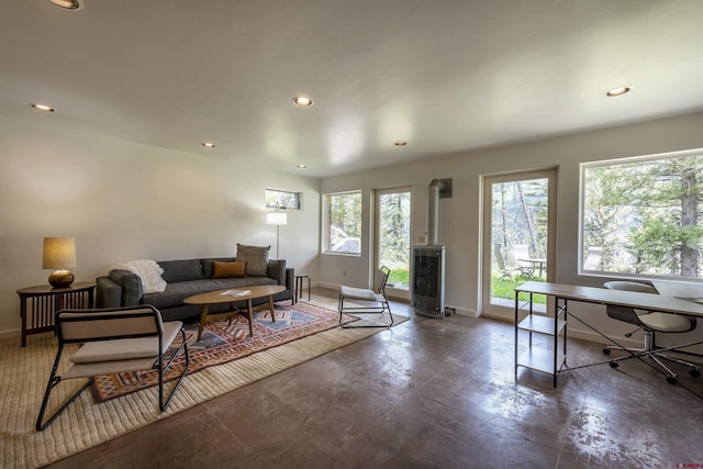123 Boulders Way, Mountain Village, CO 81435 - living room featuring a wood stove, baseboards, recessed lighting, and a desk