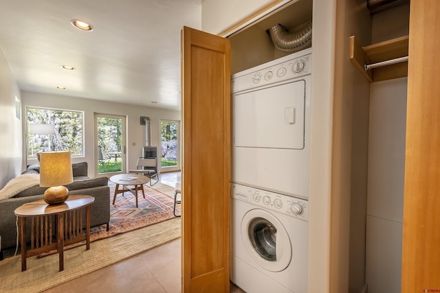 123 Boulders Way, Mountain Village, CO 81435 - laundry room featuring stacked washer / drying machine and recessed lighting
