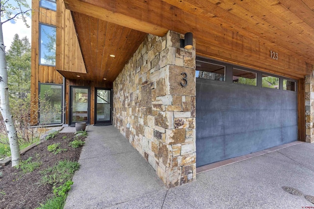 123 Boulders Way, Mountain Village, CO 81435 - view of exterior entry featuring stone siding