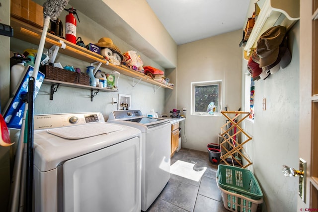 24180 Rd V.4, Dolores, CO 81323 - laundry room with washer and clothes dryer and cabinet space