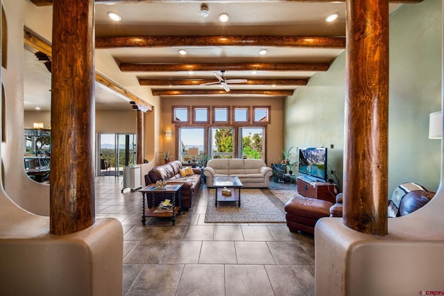 24180 Rd V.4, Dolores, CO 81323 - tiled living room featuring ornate columns, recessed lighting, and beamed ceiling