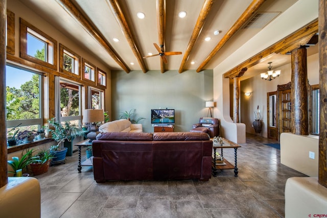 24180 Rd V.4, Dolores, CO 81323 - living area with recessed lighting, beam ceiling, decorative columns, a chandelier, and dark stone finish floors