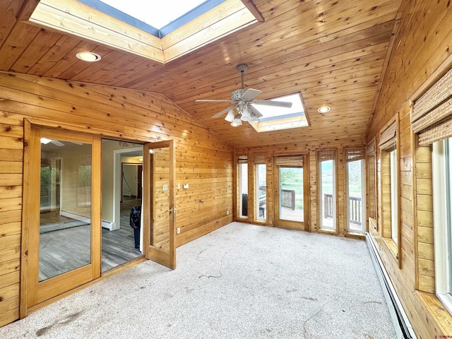 6645 Gaumer Ln, Alamosa, CO 81101 - unfurnished sunroom with a skylight, lofted ceiling, and a baseboard radiator