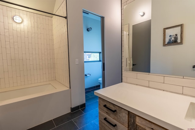 470 White Stallion Cir, Crested Butte, CO 81224 - full bathroom with tile patterned flooring, toilet, vanity, and shower / washtub combination