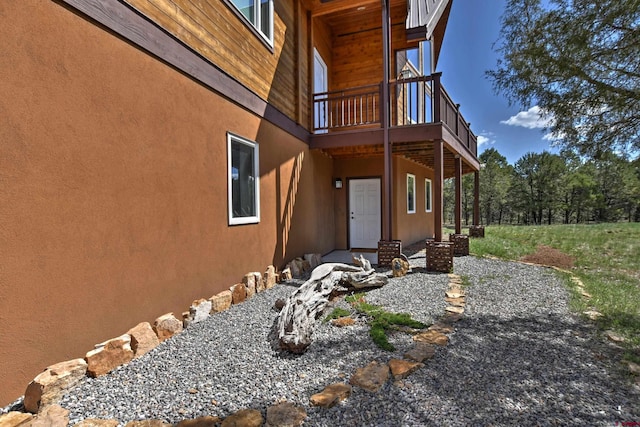76 Pinnacle Dr, Ridgway, CO 81432 - view of home's exterior with stucco siding and a deck