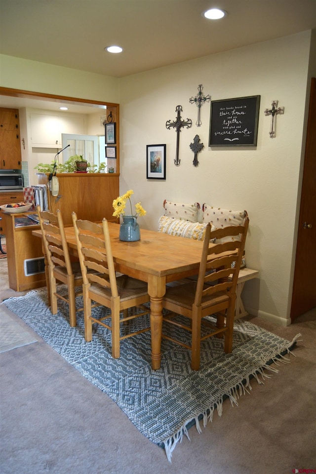 8801 2100th Rd, Austin, CO 81410 - dining area with recessed lighting, carpet, and baseboards