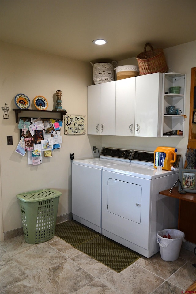 8801 2100th Rd, Austin, CO 81410 - laundry room with washing machine and clothes dryer, cabinet space, baseboards, recessed lighting, and light stone finish floors
