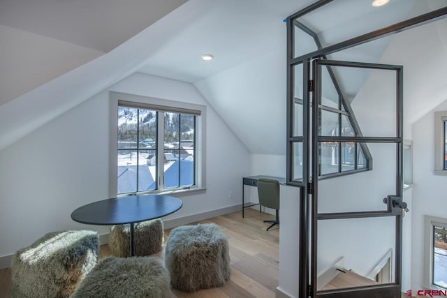 918 Belleview Ave, Crested Butte, CO 81224 - bonus room featuring wood finished floors, vaulted ceiling, and baseboards
