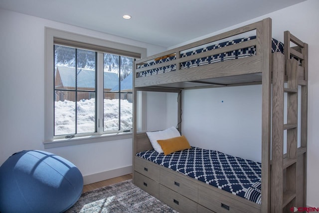 918 Belleview Ave, Crested Butte, CO 81224 - bedroom featuring wood finished floors, baseboards, and recessed lighting