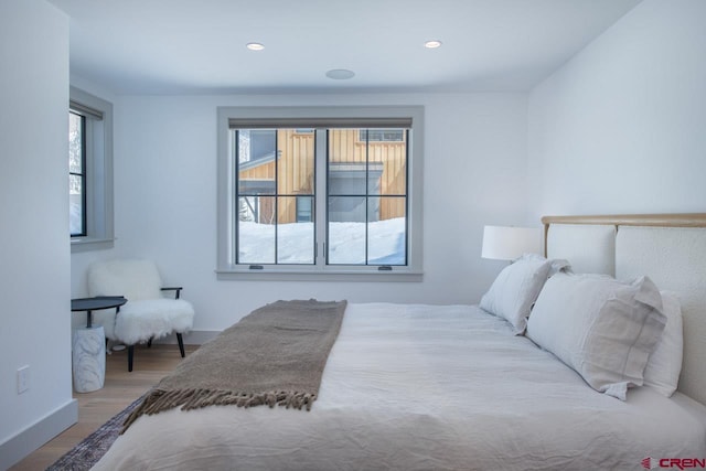 918 Belleview Ave, Crested Butte, CO 81224 - bedroom featuring wood finished floors, baseboards, and recessed lighting
