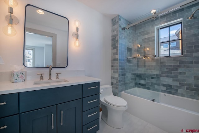 918 Belleview Ave, Crested Butte, CO 81224 - full bathroom with vanity, toilet, and shower / bath combination with glass door