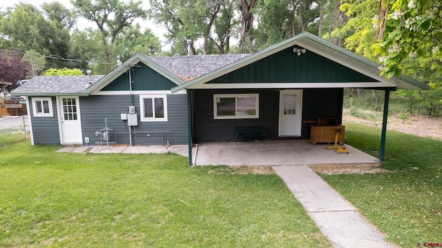 1551 G86 Rd, Delta, CO 81416 - view of front of house with a shingled roof and a patio