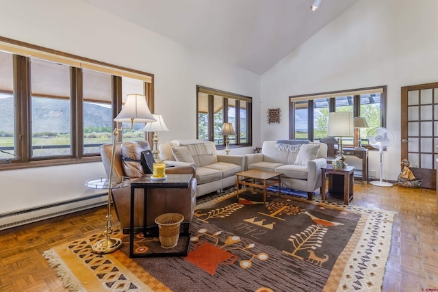 42246 US Highway 50, Gunnison, CO 81230 - living room featuring baseboard heating, high vaulted ceiling, and baseboards