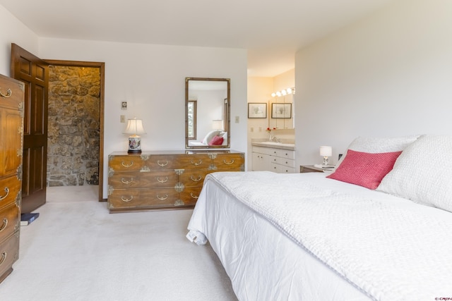 42246 US Highway 50, Gunnison, CO 81230 - bedroom featuring light carpet and connected bathroom