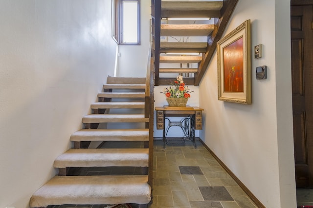 42246 US Highway 50, Gunnison, CO 81230 - stairs with stone finish floors and baseboards