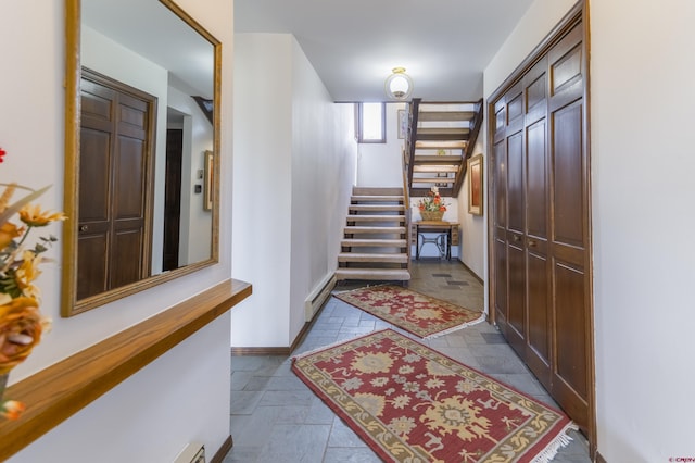 42246 US Highway 50, Gunnison, CO 81230 - entryway featuring stairs, baseboards, and stone tile flooring