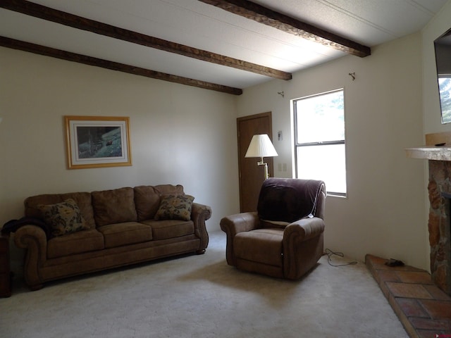 10389 W County Road 7 N, Del Norte, CO 81132 - carpeted living room featuring beam ceiling and a fireplace
