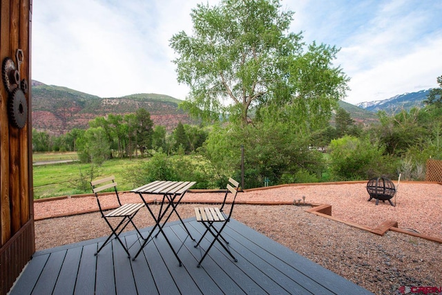 280 Marys Rd, Ridgway, CO 81432 - deck featuring a fire pit and a mountain view