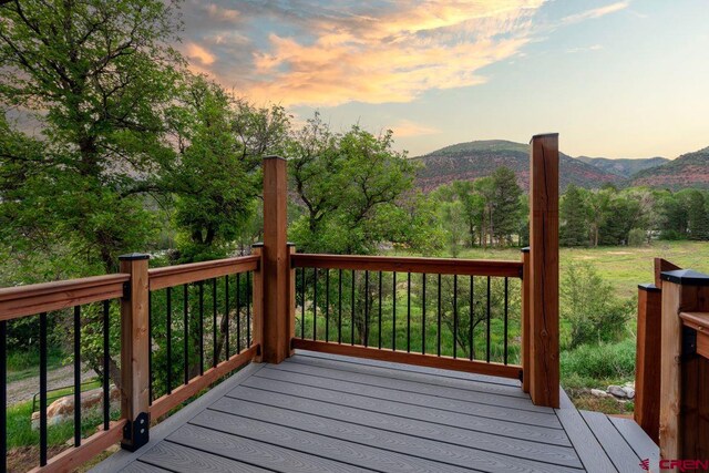 280 Marys Rd, Ridgway, CO 81432 - wooden terrace featuring a mountain view