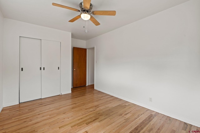 2224 Crestview Dr, Durango, CO 81301 - unfurnished bedroom featuring light wood-style flooring, a closet, baseboards, and a ceiling fan