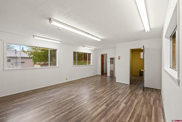 2224 Crestview Dr, Durango, CO 81301 - unfurnished room featuring wood finished floors and a heating unit