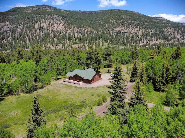 421 Elk Meadow Run, Antonito, CO 81120 - view from above of property featuring a forest and a mountain backdrop