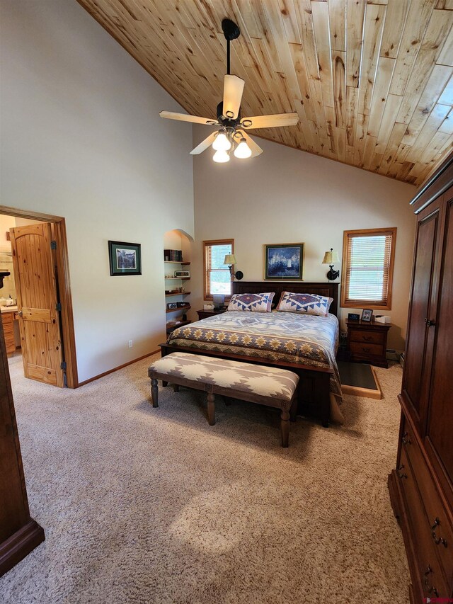 421 Elk Meadow Run, Antonito, CO 81120 - bedroom featuring carpet floors, high vaulted ceiling, baseboards, wooden ceiling, and arched walkways