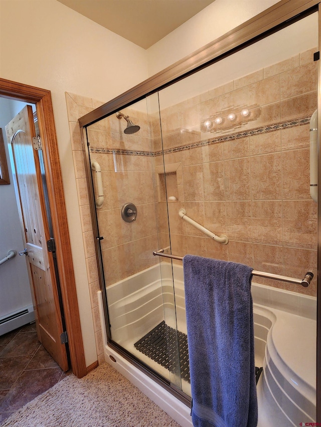 421 Elk Meadow Run, Antonito, CO 81120 - full bathroom featuring a shower stall and baseboard heating