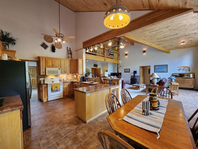 421 Elk Meadow Run, Antonito, CO 81120 - dining room featuring ceiling fan, high vaulted ceiling, and wood ceiling with exposed beams