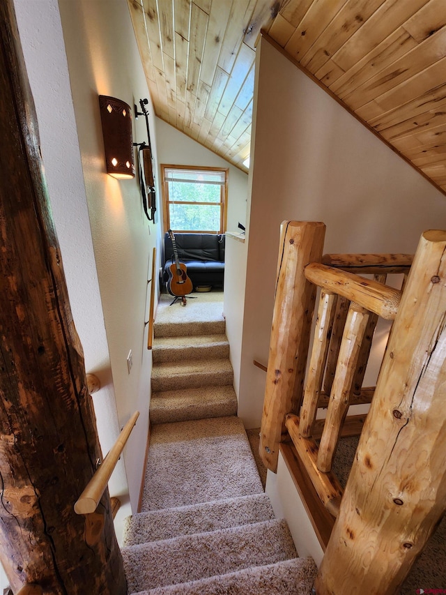 421 Elk Meadow Run, Antonito, CO 81120 - stairway with wood ceiling, vaulted ceiling, and carpet floors