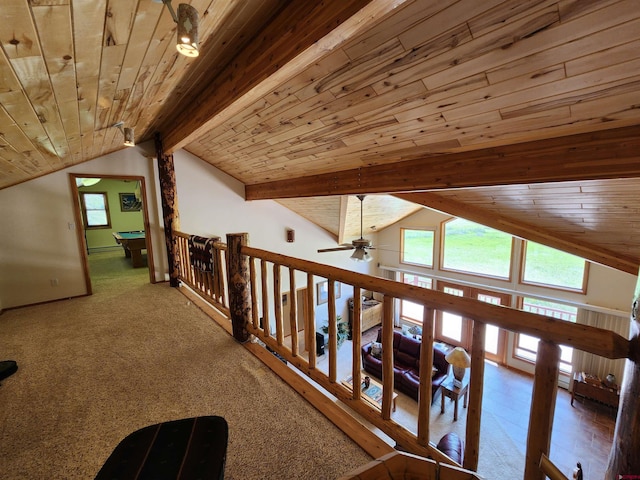 421 Elk Meadow Run, Antonito, CO 81120 - corridor with wood ceiling, baseboard heating, and carpet