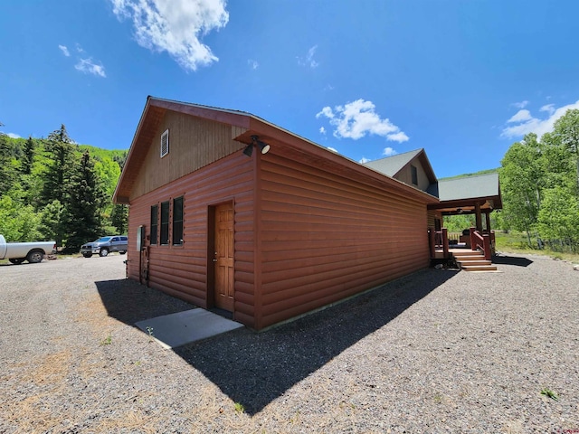 421 Elk Meadow Run, Antonito, CO 81120 - view of property exterior with faux log siding