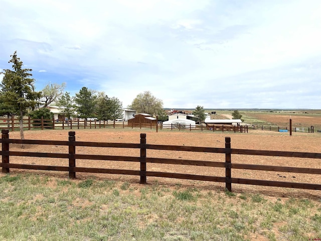 14702 Rd 14, Cahone, CO 81320 - view of yard featuring an enclosed horse arena and a rural view