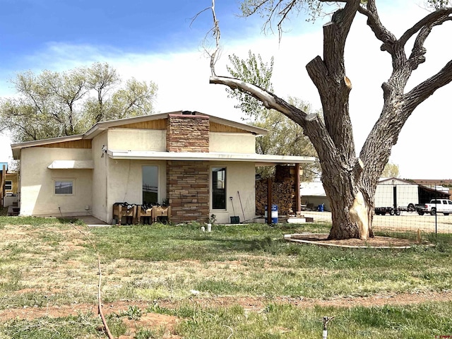 14702 Rd 14, Cahone, CO 81320 - back of property with stone siding and stucco siding