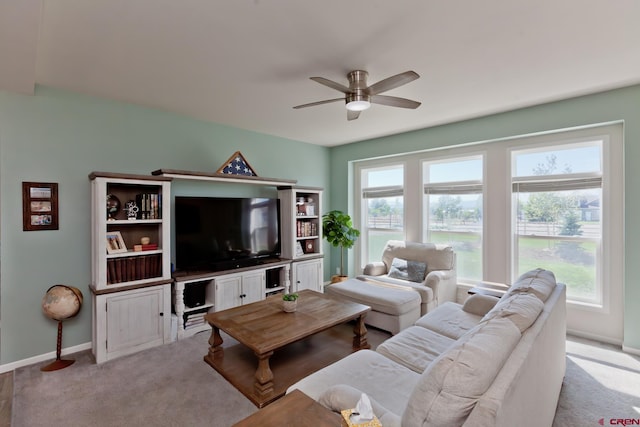 729 Spotted Pony Ct, Delta, CO 81416 - carpeted living room with a ceiling fan and baseboards