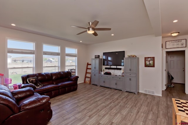 729 Spotted Pony Ct, Delta, CO 81416 - living room with a ceiling fan, light wood-type flooring, baseboards, and recessed lighting