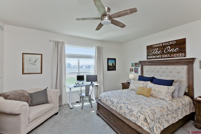 729 Spotted Pony Ct, Delta, CO 81416 - bedroom with light carpet, a desk, and a ceiling fan
