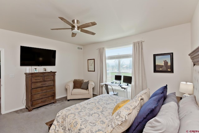 729 Spotted Pony Ct, Delta, CO 81416 - bedroom with light carpet, baseboards, and a ceiling fan