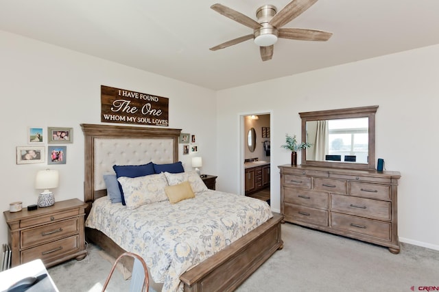 729 Spotted Pony Ct, Delta, CO 81416 - bedroom with light colored carpet, connected bathroom, ceiling fan, and baseboards