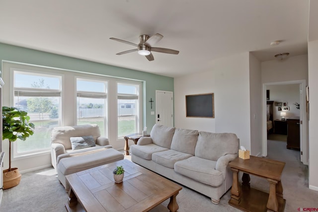 729 Spotted Pony Ct, Delta, CO 81416 - carpeted living area with a ceiling fan, plenty of natural light, and baseboards