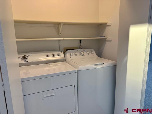 2149 Hartord Way Unit A, Montrose, CO 81401 - washroom with washer and clothes dryer