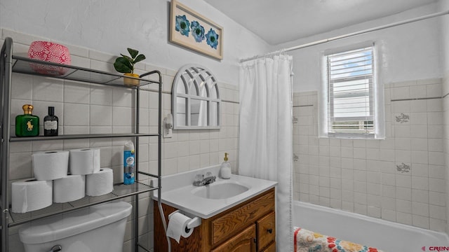 355 NW 5th St, Cedaredge, CO 81413 - full bath featuring tile walls, vanity, toilet, and shower / bath combo