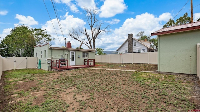 355 NW 5th St, Cedaredge, CO 81413 - view of yard with a gate and a deck