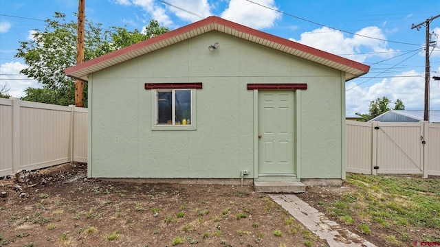 355 NW 5th St, Cedaredge, CO 81413 - view of outdoor structure featuring a gate and a fenced backyard