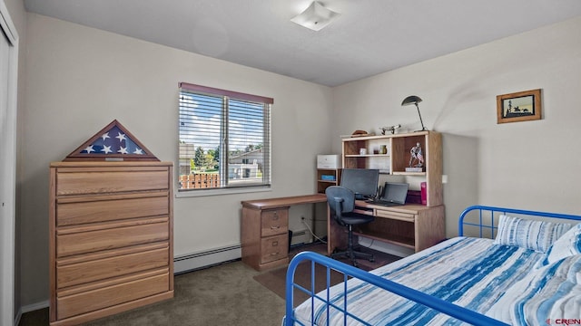 2130 Hartford Way Unit C, Montrose, CO 81401 - bedroom with carpet flooring, a baseboard radiator, and a desk