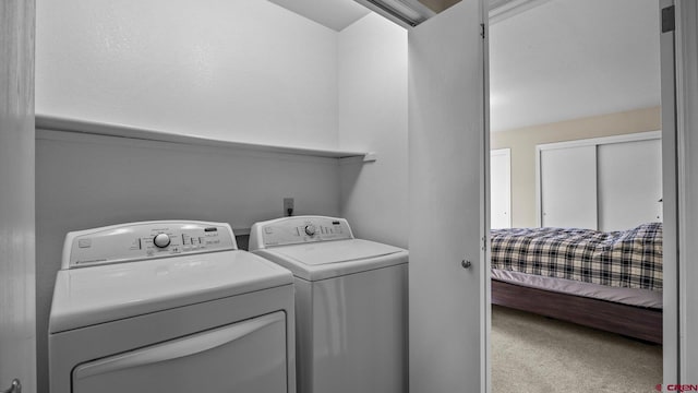 2130 Hartford Way Unit C, Montrose, CO 81401 - laundry room with carpet floors and washing machine and clothes dryer