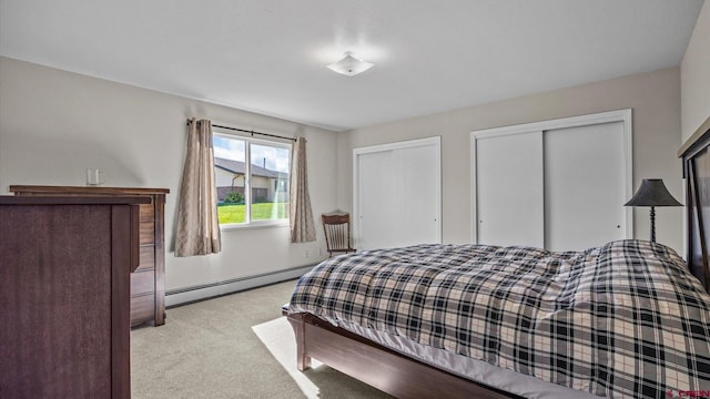 2130 Hartford Way Unit C, Montrose, CO 81401 - carpeted bedroom with a baseboard radiator and multiple closets