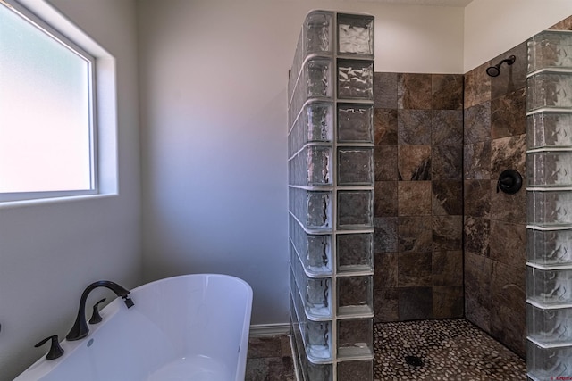 1043 Valley View Dr, Bloomfield, NM 87413 - bathroom featuring a freestanding bath and walk in shower