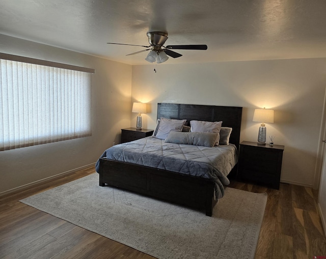 1285 Peppertree Dr, Montrose, CO 81401 - bedroom featuring wood finished floors and a ceiling fan