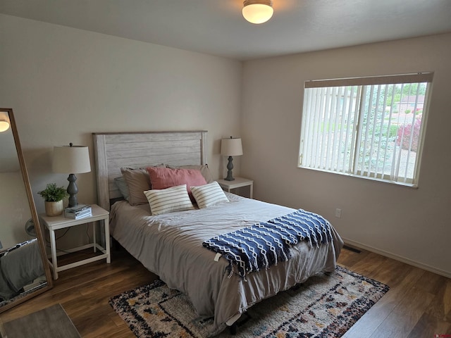 1285 Peppertree Dr, Montrose, CO 81401 - bedroom with wood finished floors and baseboards